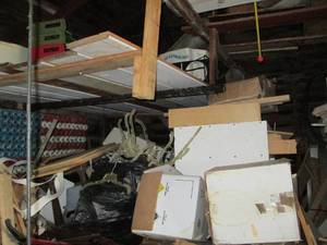 lot 0594 image: Contents of corner of a large shed