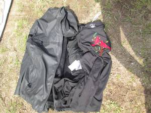 lot 620 image: Womens 2XL hooded rain coat and Ca...