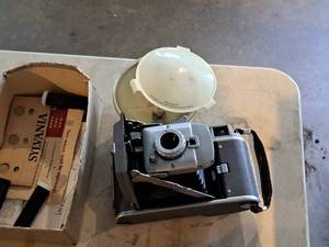 lot 564 image: Vintage Polaroid Land Camera 80 Camera with Flash Unit