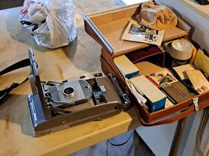 lot 563 image: Vintage Polaroid Land Camera The 800 Camera with Accessories and Camera Case