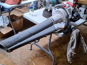 lot 658 image: Ryobi Gasoline-Powered Mulching Blower Vacuum RGBV3100