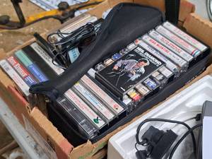 lot 743 image: Lot of (1 Box) Assorted Cassette Tapes - Neil Diamond, Reba McEntire, Elvis Presley, Hank Williams, Patsy Cline, Tammy Wynette and more