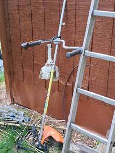 lot 787 image: Stihl FS 56C Gasoline-Powered Weed Trimmer Wand and Head