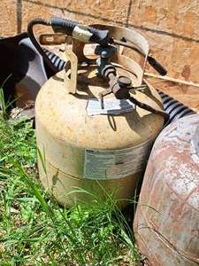 lot 804 image: Propane Tank with Mounts and Torch Attached
