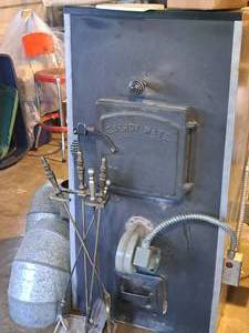 lot 382 image: Energy Mate Wood Fired Heater with Wood Storage Box