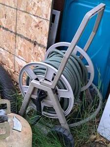 lot 807 image: Garden Hose with Hose Reel