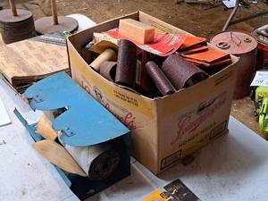 lot 813 image: Lot of (1 Box) Assorted Sanding Materials - Belts, Discs, Sheets  Dispenser