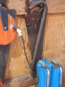 lot 857 image: Hand Saw and 24 Pry Bar