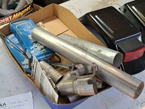 lot 879 image: Lot of  Exhaust Pipe Parts - Tube, Hangers, Adapters
