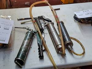 lot 888 image: (4) Grease Guns and (1) Pump