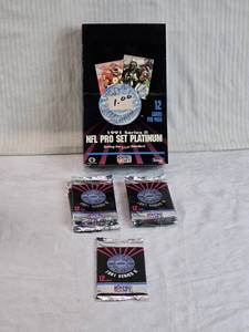 lot 46 image: Lot of 7 Unopened Packs of 1991 NFL Pro Set Platinum Series II Trading Cards