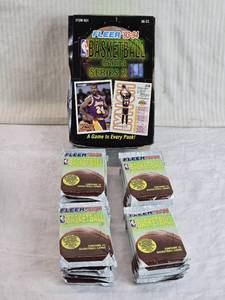 lot 49 image: Lot of 27 Unopened Packs of Fleer 1993-94 Basketball Cards Series 2