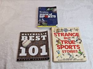 lot 69 image: Lot of Sports Books with Baseball Theme Baseballs Best 101 by Derek Gentile, The Giant Book of Strange but True Sports Stories by Howard Liss, and Devotions from the World of Sports by John & Kathy Hillman