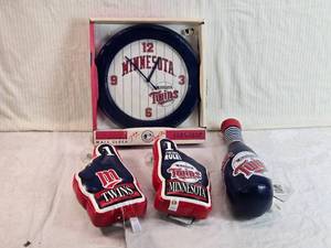 lot 89 image: Minnesota Twins Fan Merchandise Including Wall Clock and Puffy Items