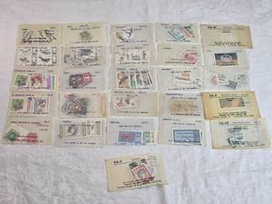lot 124 image: Lot of Vintage Worldwide Stamp Sets from countries such as Iraq, Chad, Great Britain, Bulgaria, Germany, Hungary packaged by companies like H.E. Harris & Co. and Littleton Stamp & Coin Co