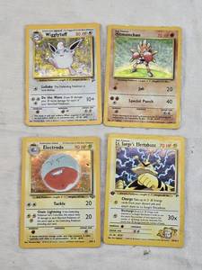 lot 163 image: Set of Vintage Pokmon Trading Cards Hitmonchan, Lt. Surges Electabuzz, Wigglytuff, and Electrode.