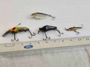 lot 224 image: Vintage Fishing Lures including Heddon Go Deep River Runt, One Labeled Finland and Others