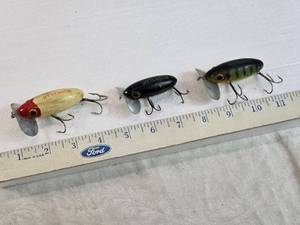 lot 225 image: Three Vintage Jitterbug Fishing Lures