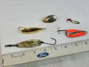 lot 246 image: Vintage Fishing Lure items include a Pacific-Arrow lure with a fish design, a Johnsons Silver Minnow, and several others