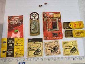 lot 247 image: Variety of  Fishing Gear and Accessories such as Lindy Rig components, weedless hooks, and snells for walleye and northern pike. The set features products from brands like Lindy Little Joe, Erwin Weller Co., and Strike King