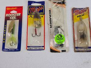 lot 254 image: Lot of 4 Fishing Lures Including Rooster Tail, Mepps, and Bomber