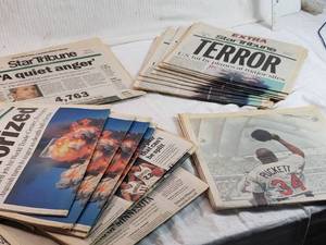 lot 323 image: Lot of Star Tribune Newspapers from September 2001 and Kirby Puckett