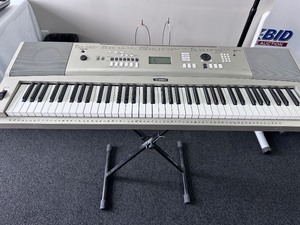lot 36 image: Yamaha YPG-235 Keyboard with Jamstand stand