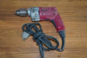 lot 31 image: Milwaukee 12 Magnum Corded Drill