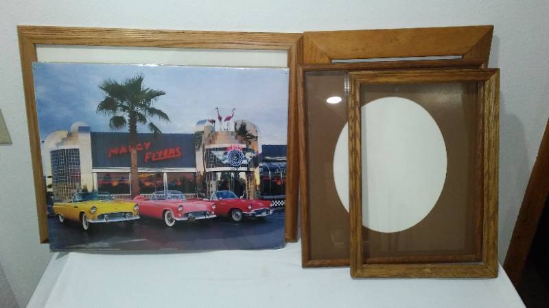 lot 39 image: Coke Anniversary Bottles (2) Collectible Bear,  Baseball and Visor Style Hats (3) Wood Frames (4) and Print. 