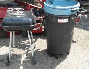 lot 32 image: 32 Gal. Rubbermaid Rolling Garbage (2) & BBQ Grill.
