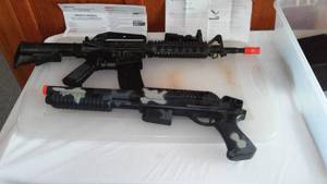 lot 52 image: Crosman Soft Air 6 MM Rifles (2)