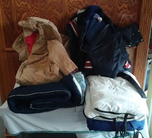 lot 81 image: Sleeping Bags, Overalls (XL Reg) and Snow Suit (M).