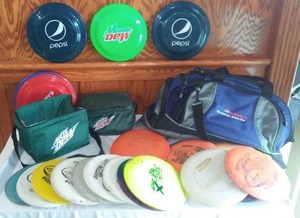 lot 88 image: Pepsi, Mt. Dew, Frisbees, Bags and Disc Golf.
