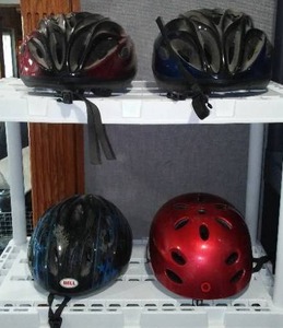 lot 89 image: Schwinn (2) Bell and Razor Safety Helmets.