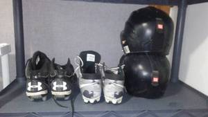 lot 90 image: Wilson Baseball Helmets (2) and shoes.