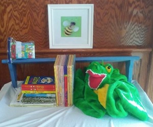 lot 93 image: Disney, Sesame Street Young Reader Books, Alligator Play suit and More.
