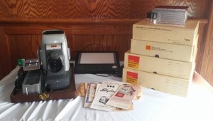 lot 101 image: SVE Skyline Slide Projector, Slide Changers, binders and carousels.