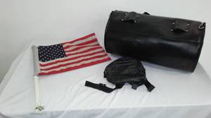 lot 129 image: Leather Motorcycle Accessories, Duffle and Harley Davidson Sack.