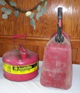 lot 186 image: 5 gal. and 2.5 gal Gasoline Cans.