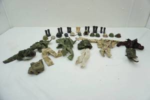 lot 40 image: G.I. Joe uniforms, boots, helmets and hats