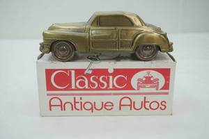 lot 54 image: 1946 Chrysler Town & Country Coin Bank
