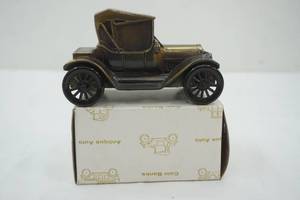 lot 56 image: 1908 Buick Coin Bank