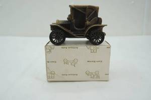 lot 58 image: 1908 Buick Coin Bank