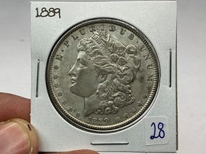 lot 28 image: 1889 Morgan Silver Dollar
