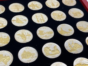 lot 83 image: 56pc Collection of Gold and Silver Highlighted Quarters