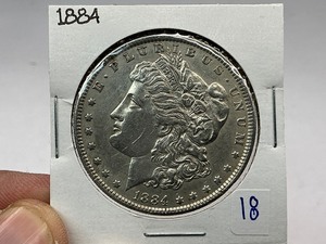 lot 18 image: 1884 Morgan Silver Dollar