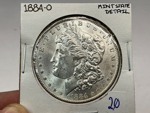 lot 20 image: 1884-O Morgan Silver Dollar