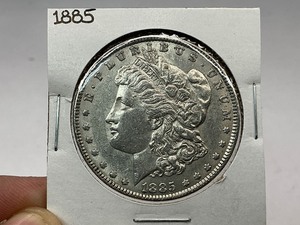 lot 21 image: 1885 Morgan Silver Dollar