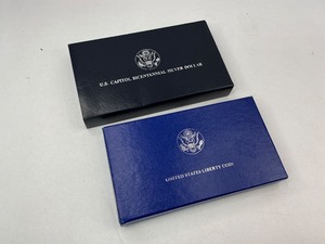 lot 97 image: 1994 & 1986 Commemorative Silver Dollars