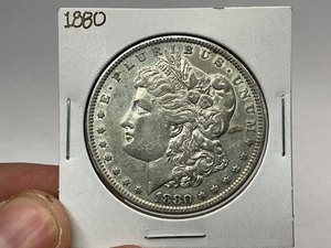 lot 102 image: 1880 Morgan Silver Dollar